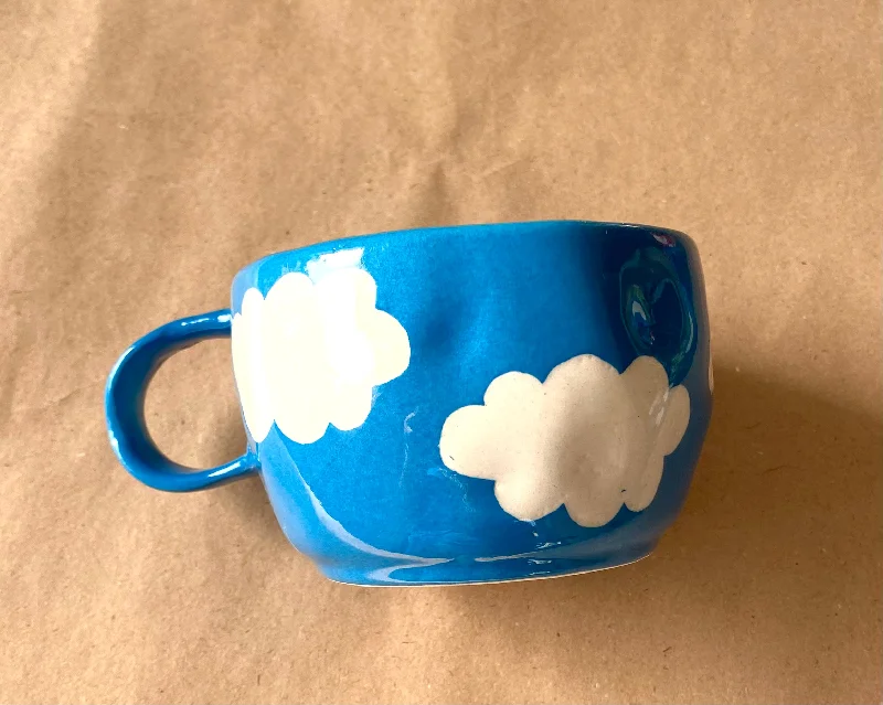 Humorous quote travel cups-Clouds Ferozi wobbly mug small. Capacity 200ml.