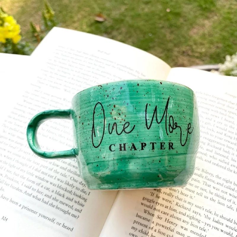 Minimalist stoneware tumblers-One more chapter wobbly mug in sea green. These mugs are hand built so each mug will be different in its crookedness and wobbliness. No two are the same.